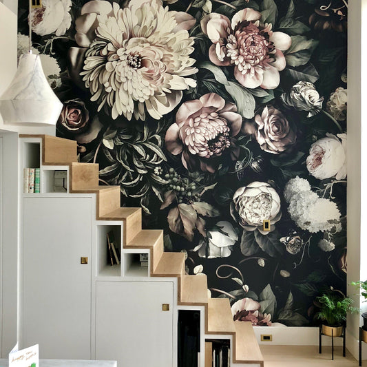 Staircase with a decorative black floral wall mural in a modern staricase.