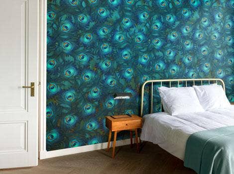 Blue feather wallpaper in bedroom