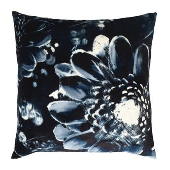 Moonlight Meadow on Velvet Cushion by designer Ellie Cashman on a bed
