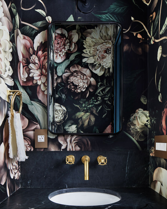 Ellie Cashman Design Dark Floral II Wallpaper in Powder room with  brass fixtures and black mirrow