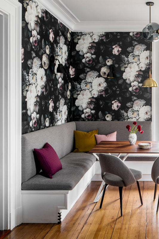 Floral Wallpaper in modern kitchen with a bench seat, and marble countertop.